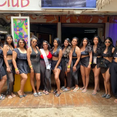 Bachelorette group posing outside El Be! Club in Tamarindo, Costa Rica